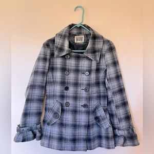 Woman’s plaid pea coat